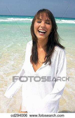 beach, carefree, brunette, amusement View Large Photo Image Stock Photograph - beach, carefree, brunette, amusement. Fotosearch