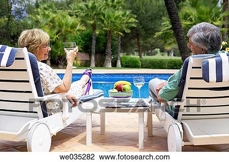 Stock Image - beach chair, calm, contemporary. Fotosearch