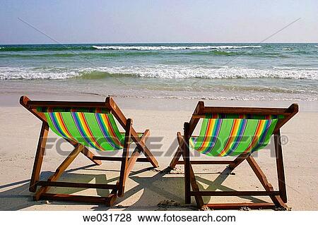 Stock Photo - Beach chair vacation, Salalah, Oman. Fotosearch