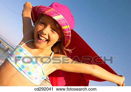 Stock Image - beach, child, Arms raised. Fotosearch