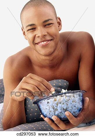Stock Image - bed, bowl, contemporary, eating. Fotosearch
