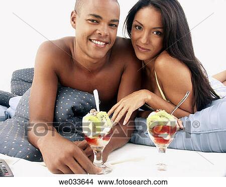 bed, contemporary, couple, ethnic View Large Photo Image Picture - bed, contemporary, couple, ethnic. Fotosearch