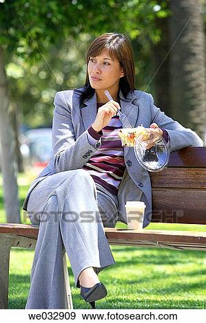 bench, business, brunette, absorbed View Large Photo Image Stock Photo - bench, business, brunette, absorbed. Fotosearch