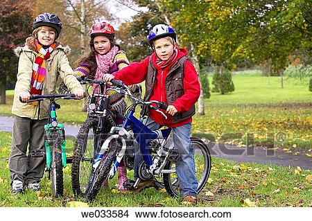 bicycle, child, brother, boy, amusement View Large Photo Image Picture - bicycle, child, brother, boy, amusement. Fotosearch