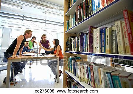 Stock Photo - book, chat, boy, bookcase, adolescence. Fotosearch
