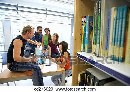 Stock Photo - book, chat, boy, bookcase, adolescence. Fotosearch