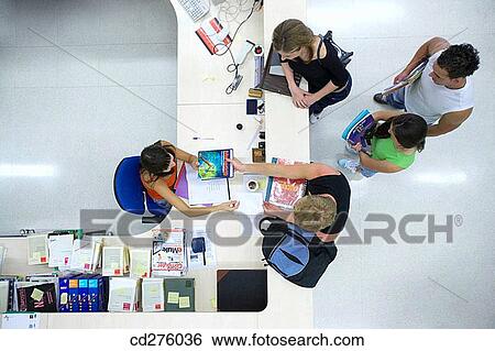 Stock Photograph - book, college, boy, adolescence. Fotosearch