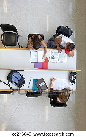 Stock Photograph - book, college, boy, adolescence. Fotosearch