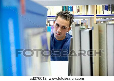 book, college, boy, bookcase, adolescence View Large Photo Image Stock Image - book, college, boy, bookcase, adolescence. Fotosearch