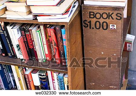 Stock Image - Books for sale on the street in Manhattan, NYC. USA. Fotosearch