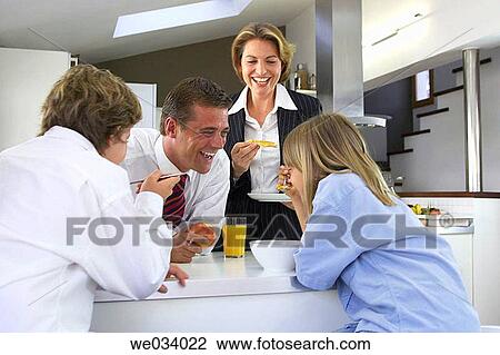 Stock Image - boy, brother, breakfast, at-home. Fotosearch