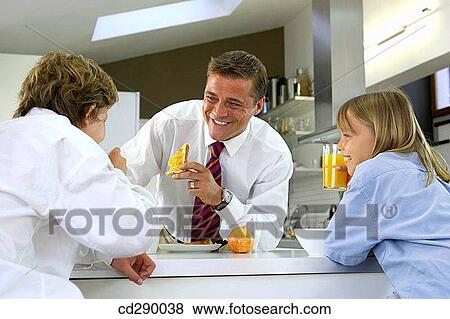 boy, brother, breakfast, at-home View Large Photo Image Stock Photo - boy, brother, breakfast, at-home. Fotosearch