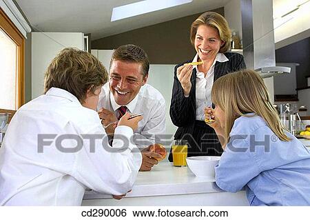 Stock Photograph - boy, brother, breakfast, at-home. Fotosearch