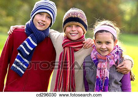Stock Image - boy, brother, cap, child. Fotosearch