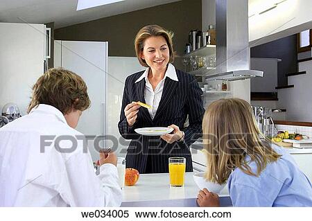 Stock Photography - boy, business, brother, breakfast, at-home. Fotosearch