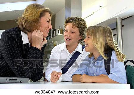 boy, businesswoman, businesspeople, brother, at-home View Large Photo Image Stock Photo - boy, businesswoman, businesspeople, brother, at-home. Fotosearch