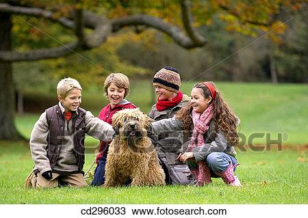 boy, caressing, caress, brother, animal View Large Photo Image Stock Image - boy, caressing, caress, brother, animal. Fotosearch