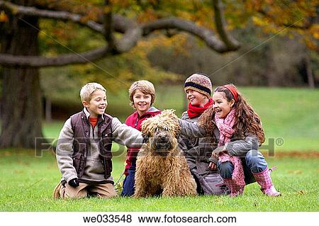boy, caressing, caress, brother, animal View Large Photo Image Stock Photo - boy, caressing, caress, brother, animal. Fotosearch
