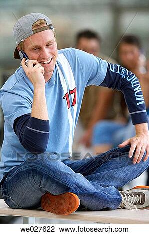 boy, cell phone, cap, adolescence View Large Photo Image Stock Image - boy, cell phone, cap, adolescence. Fotosearch
