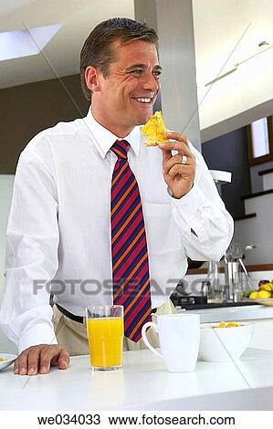 breakfast, businesspeople, businessman, business, at-home View Large Photo Image Stock Image - breakfast, businesspeople, businessman, business, at-home. Fotosearch