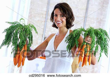 brunette, bunch, carrot View Large Photo Image Stock Photograph - brunette, bunch, carrot. Fotosearch