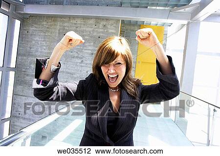 brunette, businesswoman, businesspeople, business, Arms raised View Large Photo Image Stock Image - brunette, businesswoman, businesspeople, business, Arms raised. Fotosearch