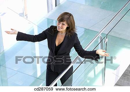 brunette, businesswoman, businesspeople, business, Arms open View Large Photo Image Stock Photo - brunette, businesswoman, businesspeople, business, Arms open. Fotosearch