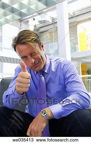 Stock Image - business, businesspeople, businessman, approval. Fotosearch