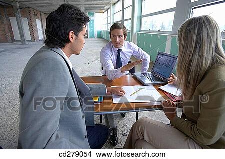 Picture - business, businesswoman, businesspeople, businessman, 30's. Fotosearch