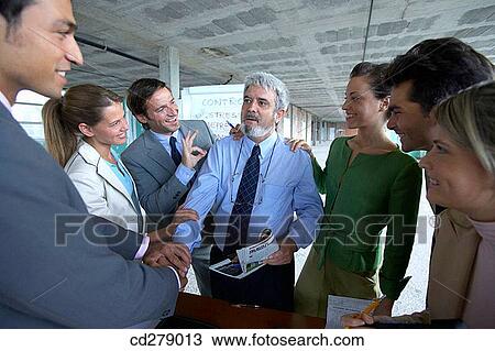 Stock Image - business, businesswoman, businesspeople, businessman, agreement. Fotosearch