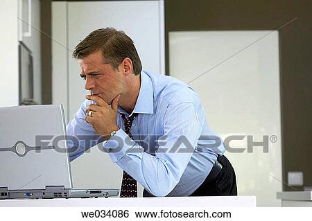 Stock Photograph - business, casual, businesspeople, businessman, at-home. Fotosearch