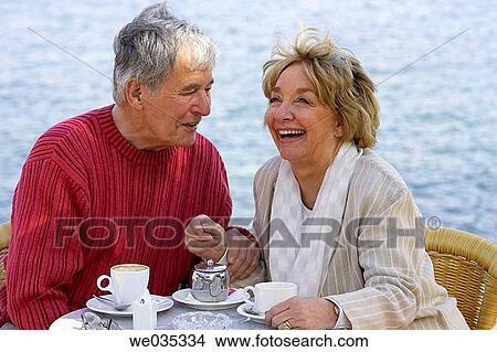 Cafe terrace, chat, coffee View Large Photo Image Picture - Cafe terrace, chat, coffee. Fotosearch