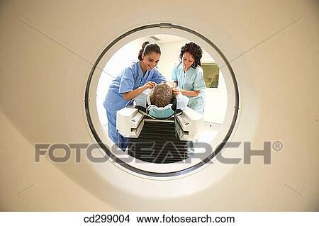 Picture - CAT (Computerized Axial Tomography), medical imaging for diagnosis. Fotosearch