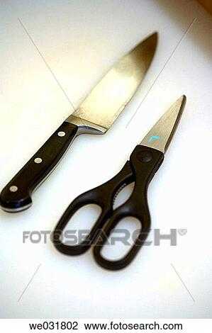Chef knife and chef scissor on cutting board View Large Photo Image Stock Image - Chef knife and chef scissor on cutting board. Fotosearch