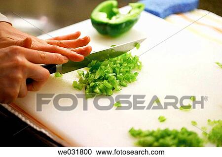 Chef/Cook cutting green peppers View Large Photo Image Stock Image - Chef/Cook cutting green peppers. Fotosearch