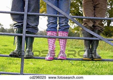 child, balance, brother, boy, boot, accessory View Large Photo Image Stock Photography - child, balance, brother, boy, boot, accessory. Fotosearch