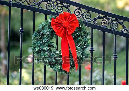 Christmas wreath on gate View Large Photo Image Stock Photo - Christmas wreath on gate. Fotosearch
