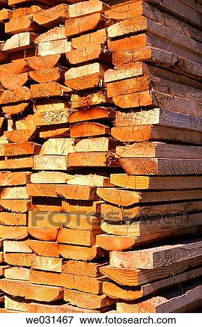 Stock Photo - Close-up of lumber ends in pile of stacked lumber. Fotosearch
