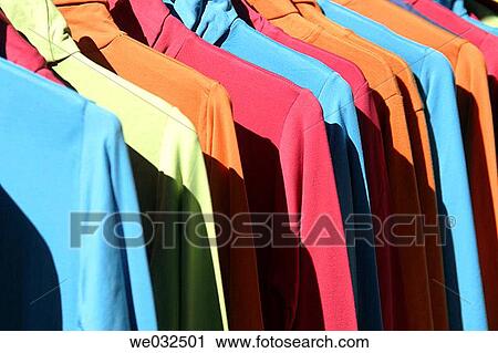 Clothes in flea market View Large Photo Image Stock Image - Clothes in flea market. Fotosearch