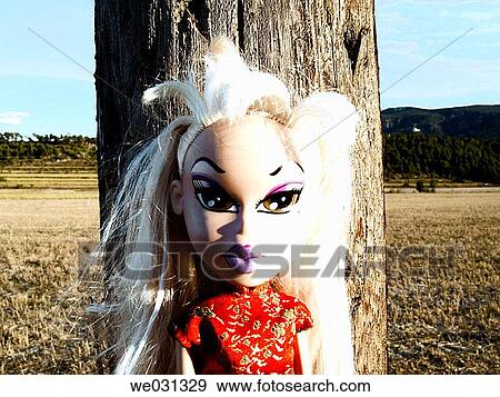 Stock Photo - concept, country, day, doll, head and shoulders. Fotosearch