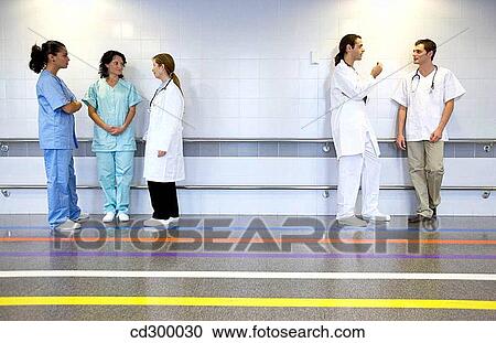 Stock Image - Doctors and nurses in the department of medical imaging for diagnosis. Fotosearch
