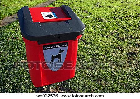 Stock Photograph - Dog waste bin in residential area. Fotosearch