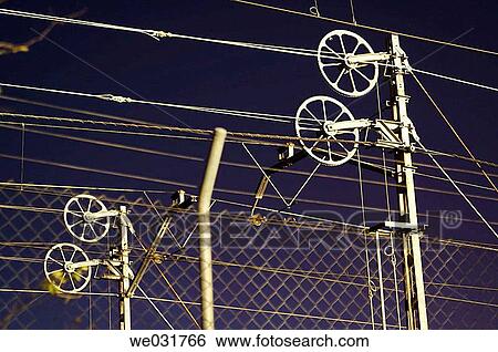 Electricity wires in railway tracks. Pinto. Madrid. Spain. View Large Photo Image Stock Photograph - Electricity wires in railway tracks. Pinto. Madrid. Spain.. Fotosearch
