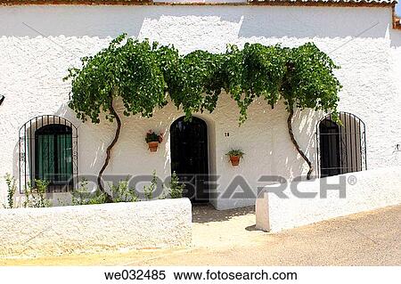 Entrance to Cuevas Pedro Antonio Alarc? n troglodyte hotel, Guadix. Granada province, Andalusia, Spain View Large Photo Image Stock Photography - Entrance to Cuevas Pedro Antonio Alarc? n troglodyte hotel, Guadix. Granada province, Andalusia, Spain. Fotosearch