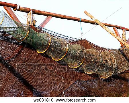 Fishtraps hung to dry View Large Photo Image Stock Image - Fishtraps hung to dry. Fotosearch