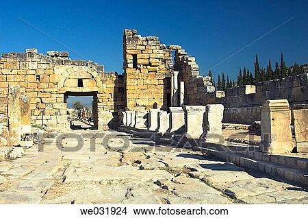 Frontinus Street and the south gate in the ruins of Hierapolis, Turkey. View Large Photo Image Picture - Frontinus Street and the south gate in the ruins of Hierapolis, Turkey.. Fotosearch