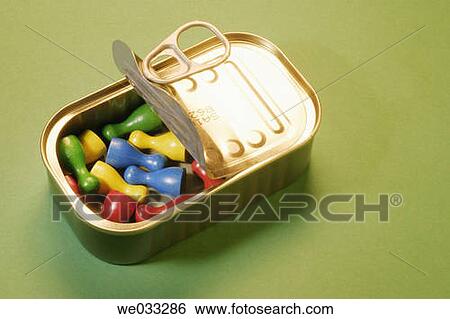 Stock Photograph - Game pieces in tin can. Fotosearch