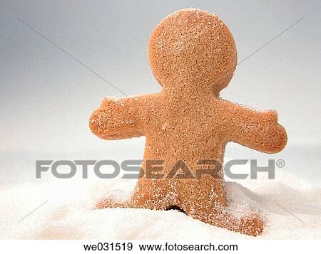Gingerbread cookie figure in sugar snow drift View Large Photo Image Stock Photo - Gingerbread cookie figure in sugar snow drift. Fotosearch