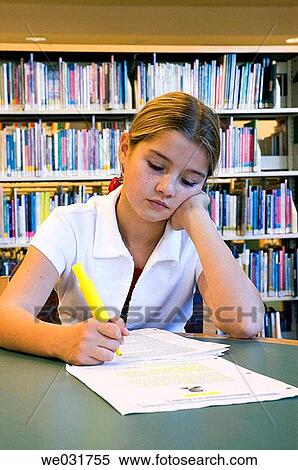 Girl studying in library View Large Photo Image Stock Photography - Girl studying in library. Fotosearch