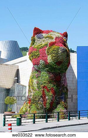 Guggenheim Museum by Frank O. Gehry with? Puppy?, sculpture by Jeff Koons, at fore. Bilbao. Biscay, Euskadi, Spain View Large Photo Image Stock Image - Guggenheim Museum by Frank O. Gehry with? Puppy?, sculpture by Jeff Koons, at fore. Bilbao. Biscay, Euskadi, Spain. Fotosearch